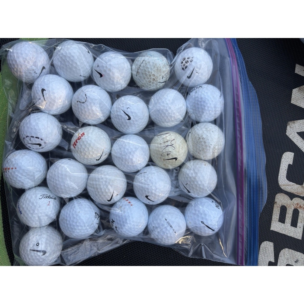24 Used Nike Golf Balls